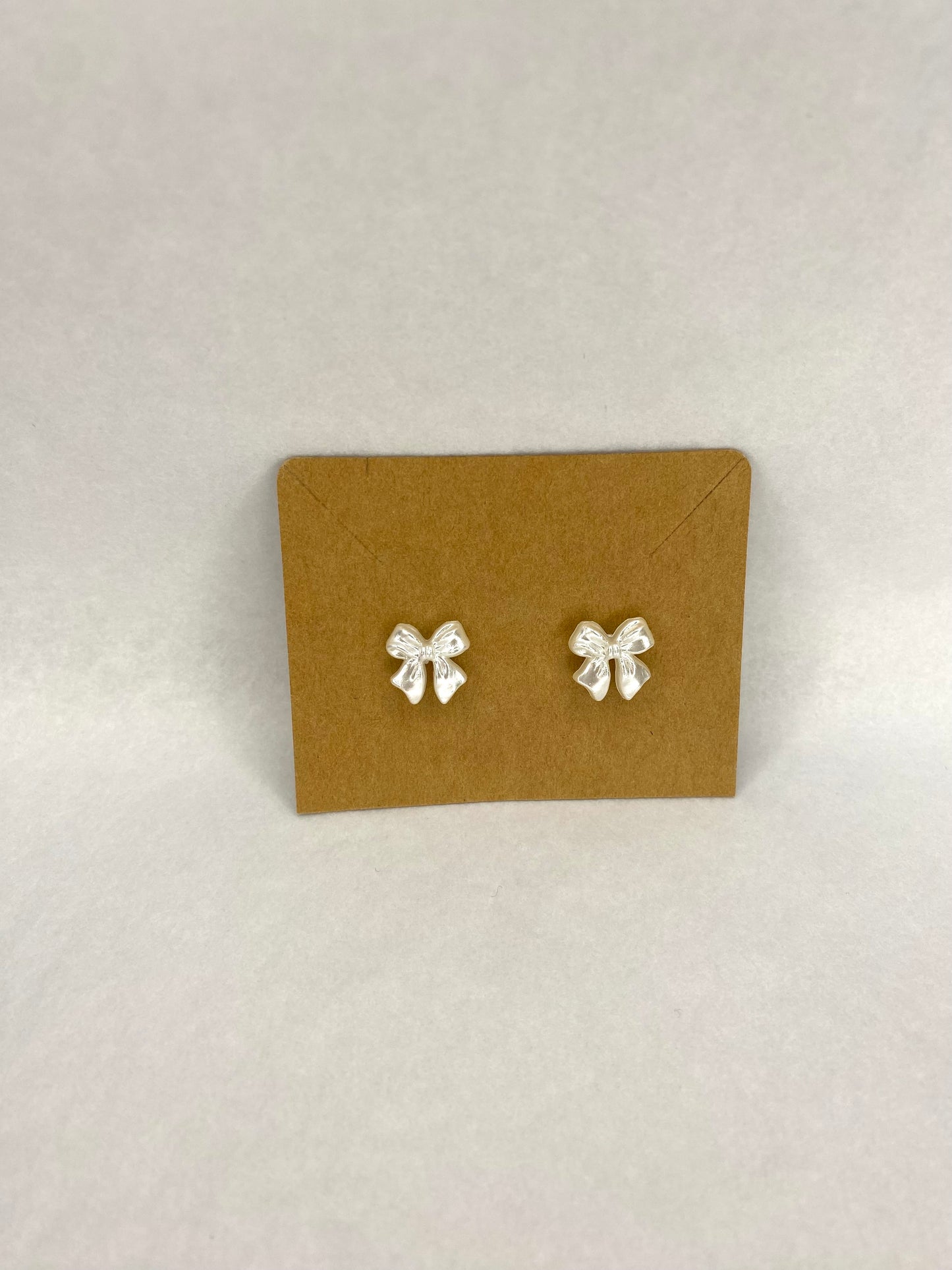 White Bow Stud Earrings